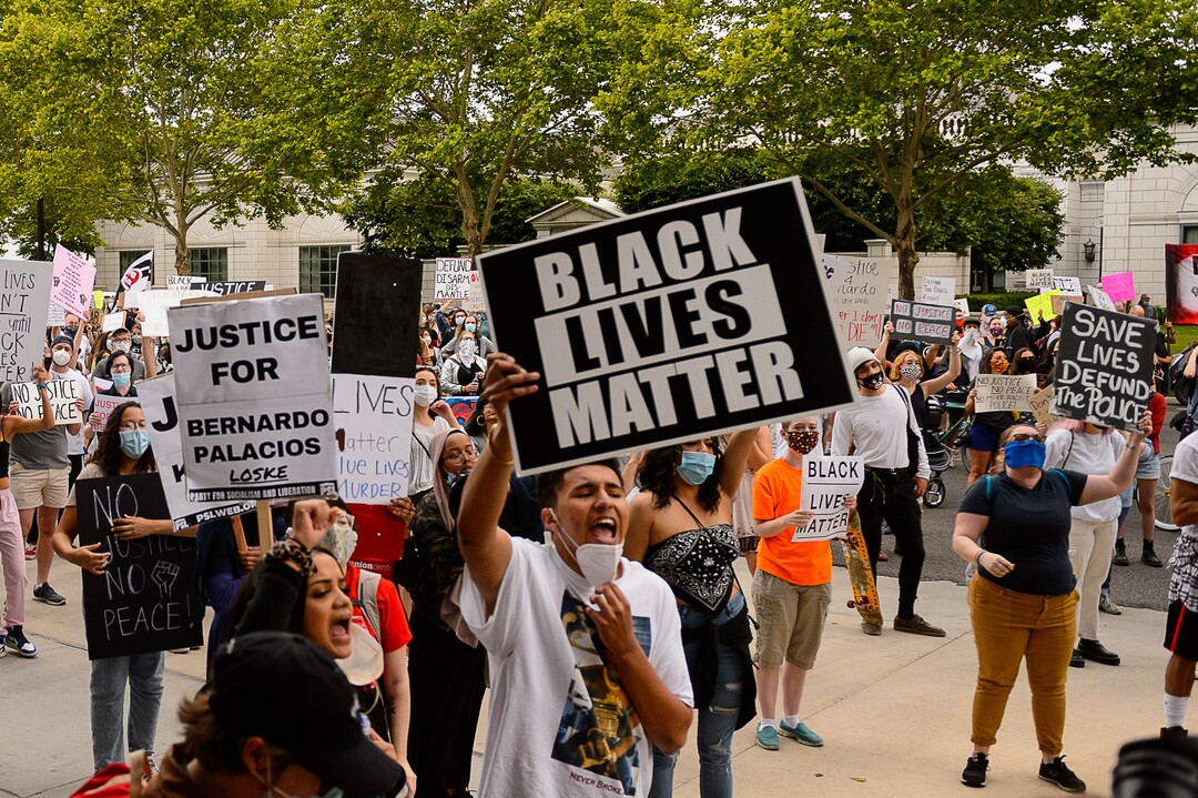 (Trent Nelson  |  The Salt Lake Tribune) People gather at the Salt Lake County District Attorney's office to protest against police brutality in Salt Lake City on Saturday, June 13, 2020.