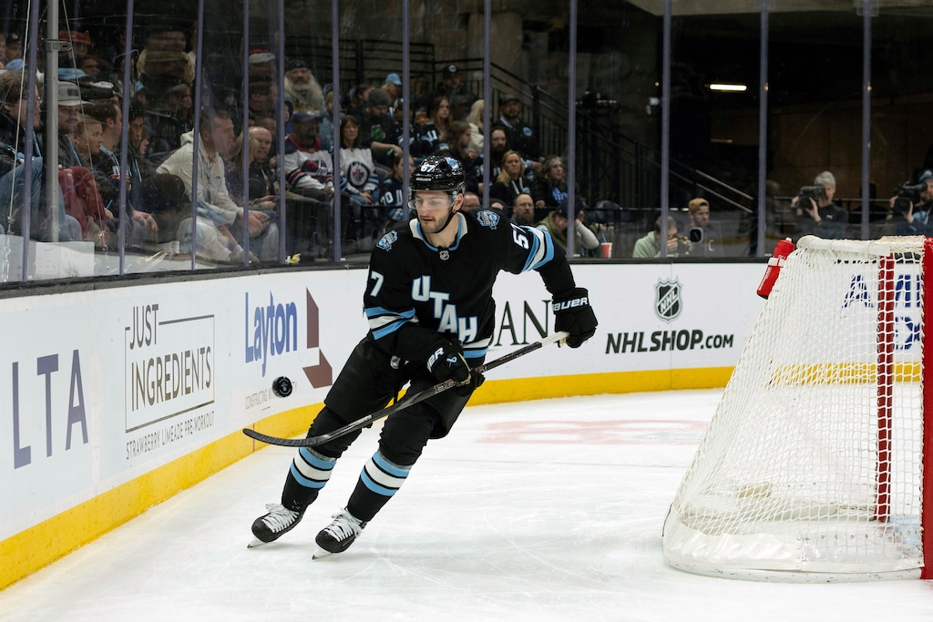 Utah Hockey Club defense Nick DeSimone juggles the puck during the second period of an NHL hockey game against the Winnipeg Jets, Monday, Jan. 20, 2025, in Salt Lake City. (AP Photo/Melissa Majchrzak)