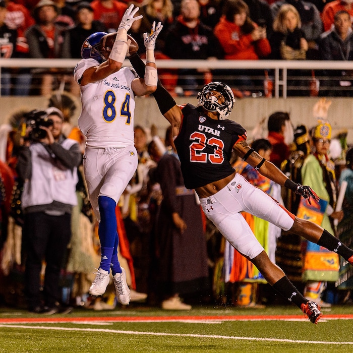 (Trent Nelson | The Salt Lake Tribune)  San Jose State Spartans wide receiver Bailey Gaither (84) pulls in a touchdown pass, defended by Utah Utes defensive back Julian Blackmon (23), as the Utah Utes host the San Jose State Spartans, NCAA football at Rice-Eccles Stadium in Salt Lake City, Saturday September 16, 2017.