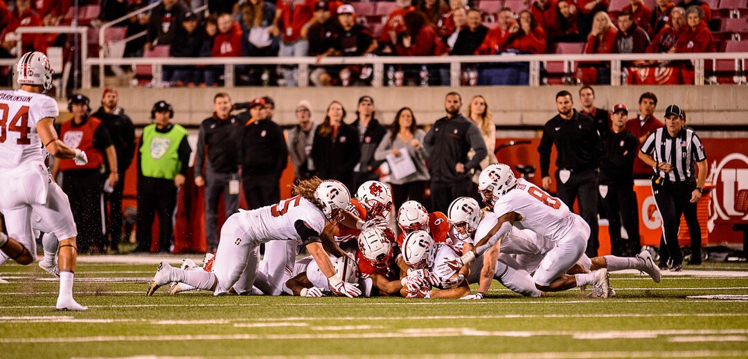 (Trent Nelson | The Salt Lake Tribune)  Utah and Stanford players dive for an onside kick in the final minute as the University of Utah hosts Stanford, NCAA football at Rice-Eccles Stadium in Salt Lake City Saturday October 7, 2017.