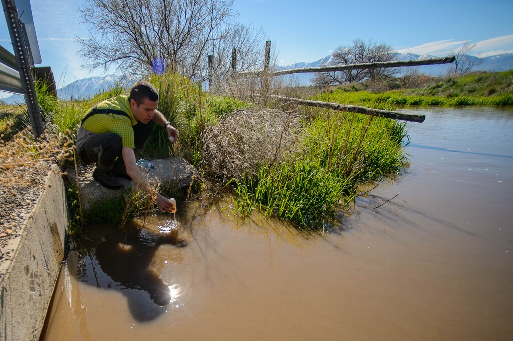 (Trent Nelson | The Salt Lake Tribune)
Ben Abbott, Assistant Professor of Ecosystem Ecology at BYU, takes a water sample from Utah Lake's Benjamin Slough on Thursday April 25, 2019. The scientist is facing a $3 million defamation lawsuit arising from criticism he has directed at a proposal to dredge Utah Lake.