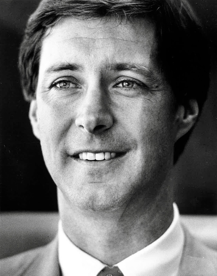 (Tribune File Photo)  University of Utah Athletic Director Dr. Chris Hill gives an interview to the Tribune in his office, November of 1987. The 37- year-old Hill was named athletic director a month earlier and he talked his objectives in administering the schools approximately $6 million athletics budget.