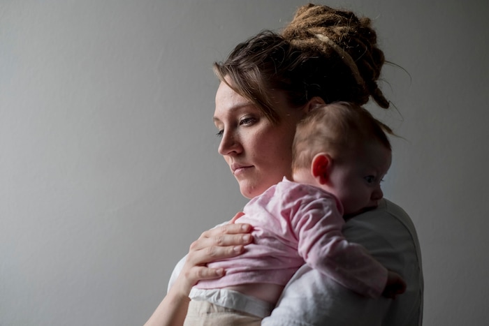 Christine Duckwitz holds her 2-month-old daughter, Isabelle Mansker, at the Decatur Correctional Center in Decatur, Illinois on April 9, 2018. (Whitney Curtis | The Washington Post)