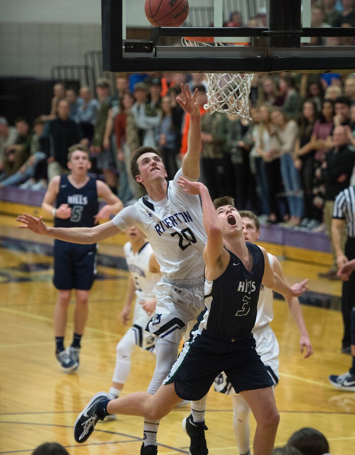 Scott Sommerdorf | The Salt Lake TribuneRiverton's Ryen Edwards cannot block Stone Hutchings' second half layup.Copper Hills defeated Riverton 54-50, Friday, February, 2, 2018. 