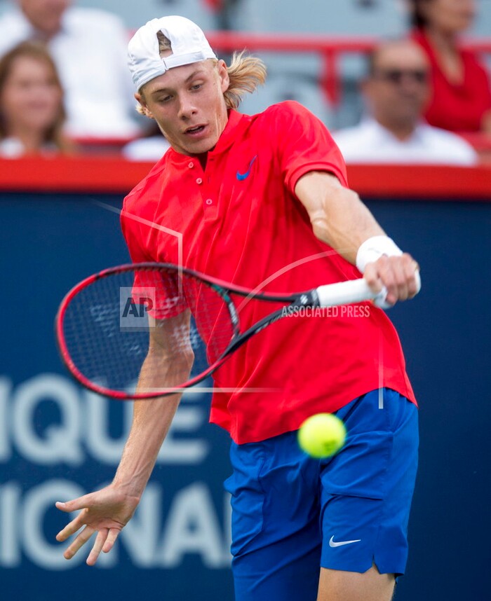 Denis Shapovalov, of Canada, returns to Adrian Mannarino, of France, during a quarterfinal at the Rogers Cup tennis tournament Friday, Aug. 11, 2017, in Montreal. (Paul Chiasson/The Canadian Press via AP)