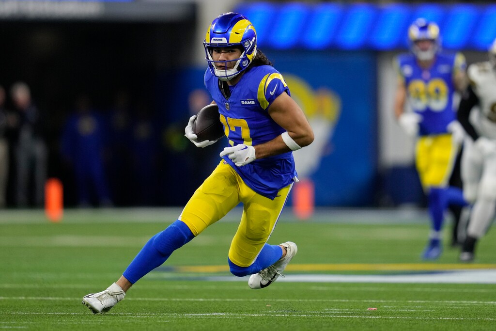 (Ashley Landis | AP) Los Angeles Rams wide receiver Puka Nacua runs after a catch during the first half of an NFL football game against the New Orleans Saints. Thursday, Dec. 21, 2023, in Inglewood, Calif.