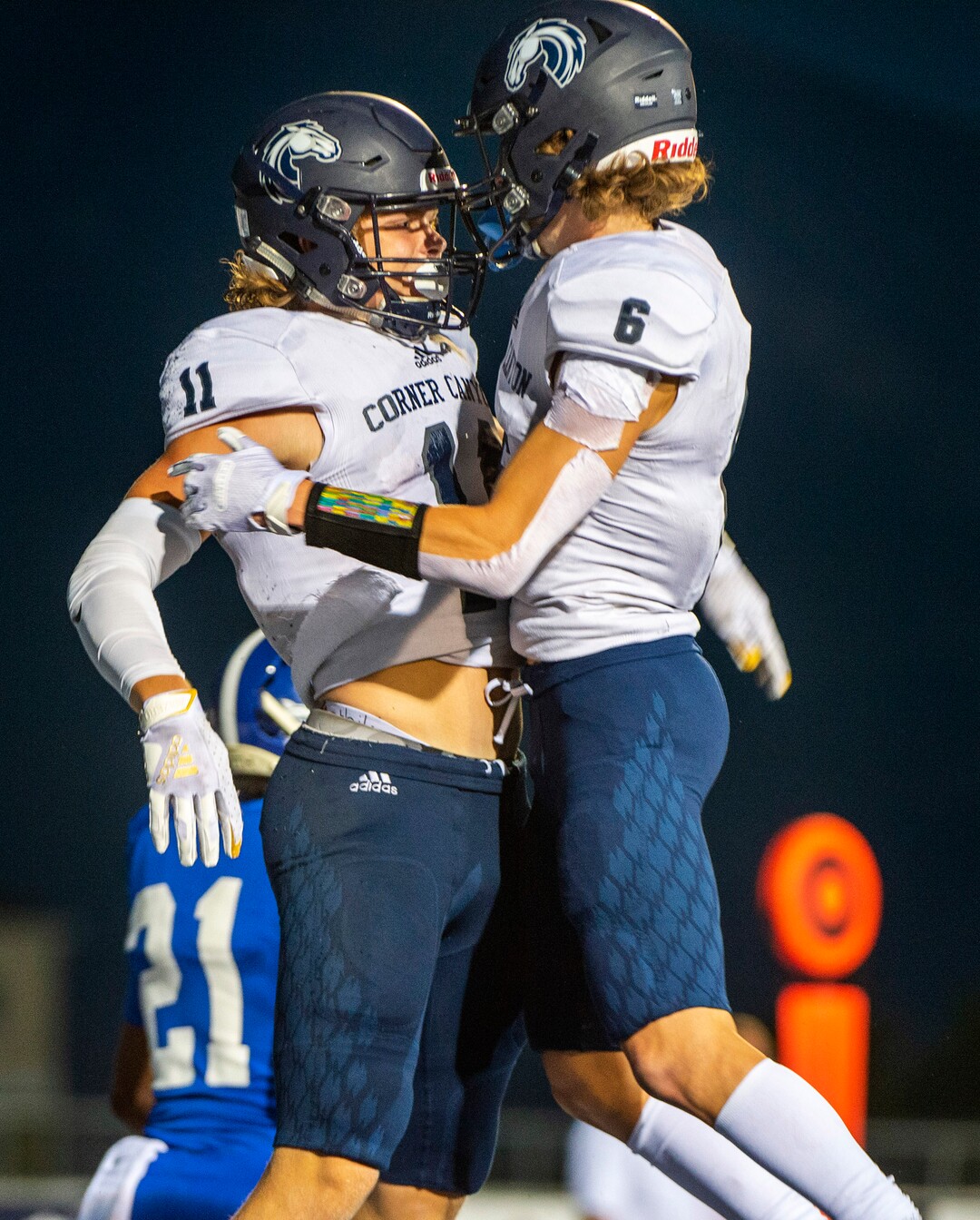 (Rick Egan  |  The Salt Lake Tribune)     Corner Canyon  receiver Jett Meine (11) celebrates his touchdown catch with Talmage Handley in prep action between the Bingham Miners and the Corner Canyon Chargers, at Bingham High onFriday, Aug. 28, 2020.