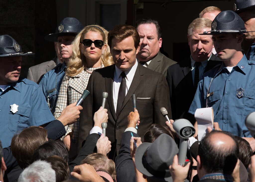 This image released by Entertainment Studios shows Jason Clarke as Ted Kennedy, center, and Andria Blackman as Joan Kennedy in a scene from "Chappaquiddick." (Claire Folger/Entertainment Studios via AP)