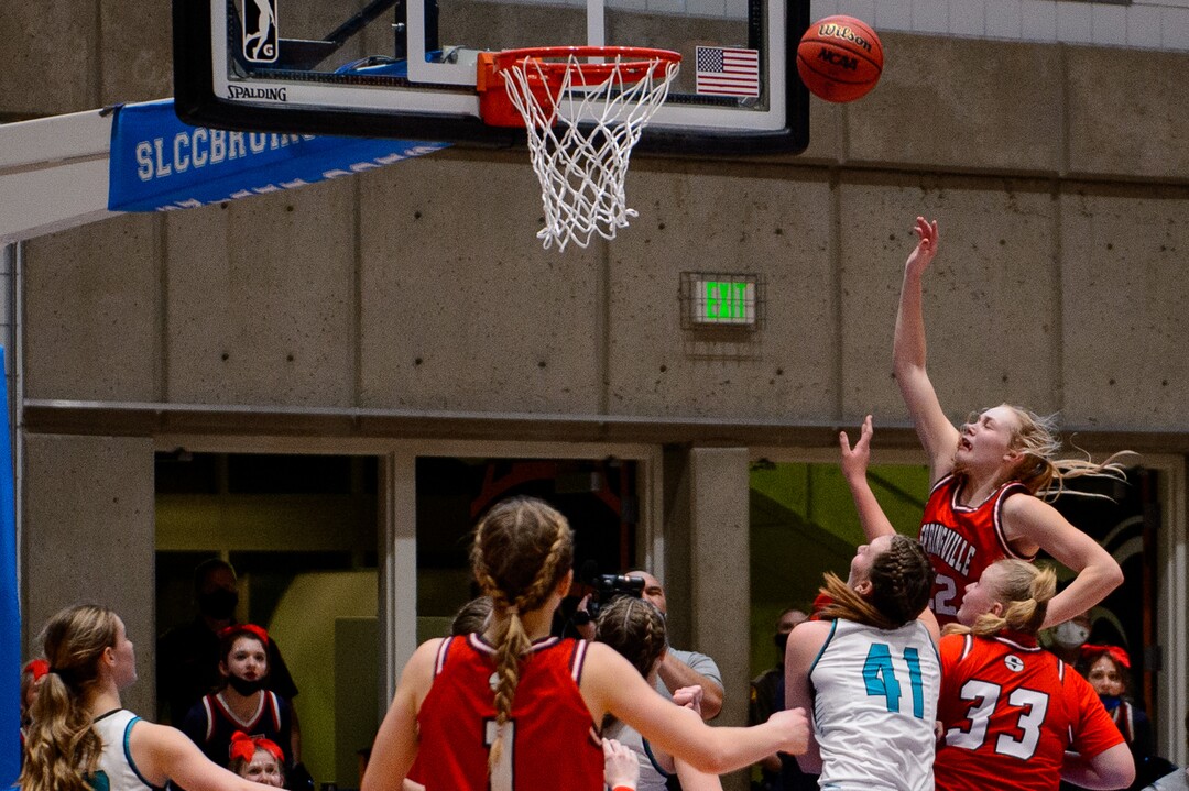 (Trent Nelson  |  The Salt Lake Tribune) Springville's Lauryn Deede scores a buzzer-beater to defeat Farmington High School in the 5A girls basketball state championship game, in Taylorsville on Saturday, March 6, 2021.