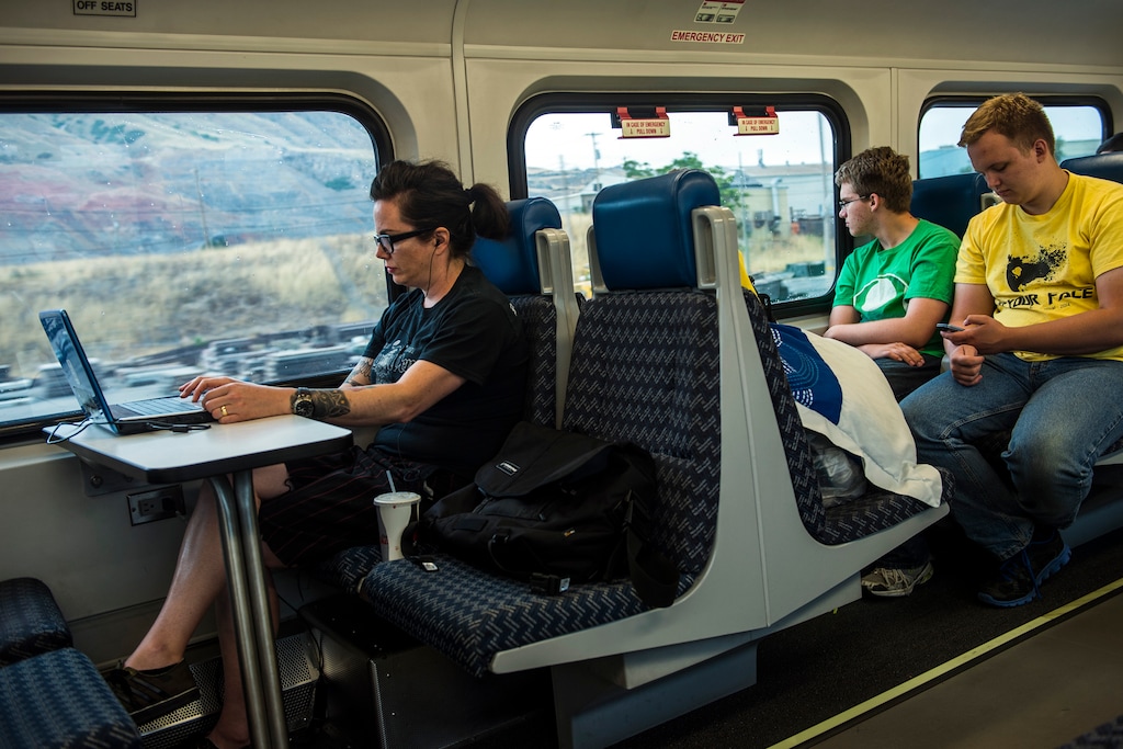 (Chris Detrick  |  Tribune file photo)  Allison Budzban, of Ogden, uses the free wifi on her laptop while riding the UTA FrontRunner to Ogden from Salt Lake City on Tuesday, July 29, 2014.