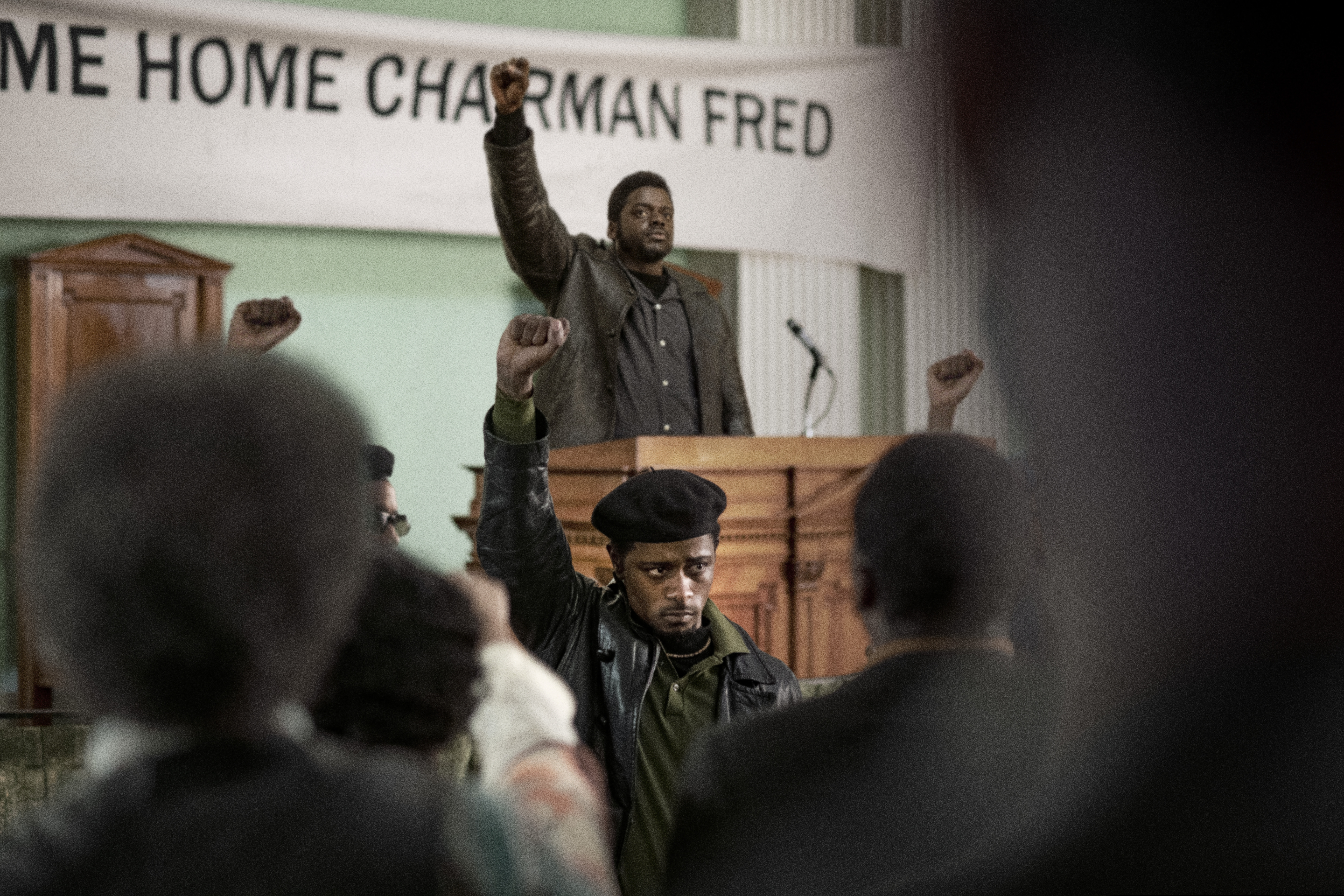 (Glen Wilson | courtesy Warner Bros. Pictures) Daniel Kaluuya, top, plays Black Panther Party leader Fred Hampton, while LaKeith Stanfield (in front of the podium) plays his friend-turned-informant, William O'Neal, in director Shaka King's political drama "Judas and the Black Messiah." The film has been added to the Premieres program of the 2021 Sundance Film Festival.