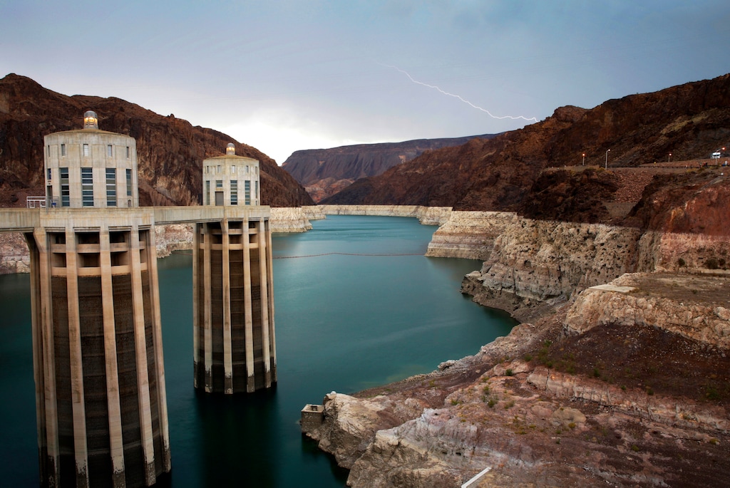 (John Locher | The Associated Press) In this July 28, 2014, file photo, lightning strikes over Lake Mead near Hoover Dam that impounds Colorado River water at the Lake Mead National Recreation Area in Arizona. California and Arizona have missed a federal deadline for seven Western states to wrap up work on a plan to ensure the drought-stricken Colorado River can deliver water to millions of people who depend on it.
