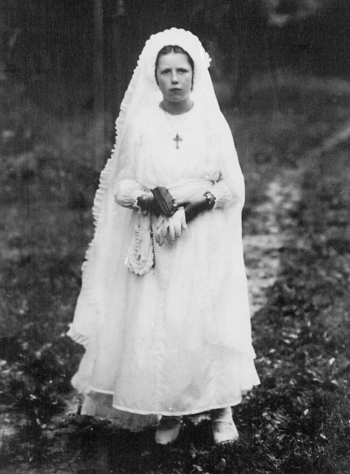 (Photo courtesy of the Moseley family)  Lonnie Moseley's silk parachute was later transformed into a First Communion dress for the Lestang daughter.