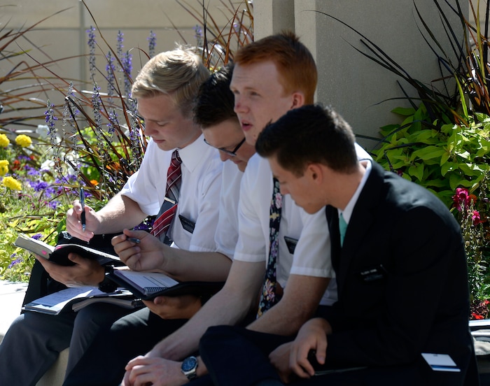 Al Hartmann  |  The Salt Lake TribuneMissionaries study in a small group on the plaza of the new building at the Missionary Training Center in Provo Wednesday July 26.  The new building which opened in June provides numerous places inside and out for contemplation and study. 