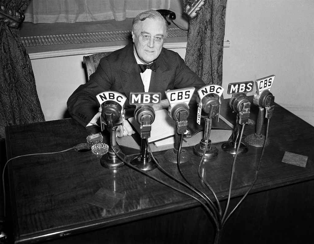 (Henry Griffin | AP file photo)
In this Feb. 27, 1941, photo President Franklin D. Roosevelt speaks on the radio from the Oval Room of the White House. During an extraordinary 12 years in office, Roosevelt guided the nation through a bleak period of Depression-era unemployment, a severe Midwest drought known as the Dust Bowl and battle against the Nazis and Japanese in World War II.