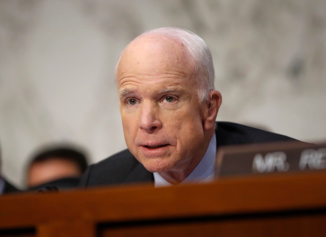 FILE - In this Sept. 26, 2017, file photo, Chairman of the Senate Armed Services Committee Sen. John McCain, R-Ariz., questions Joint Chiefs Chairman Marine Corps Gen. Joseph Dunford on Capitol Hill in Washington. The AP reported on Oct. 13, 2017, that a story claiming evidence showed McCain funded the creation of a dossier of unproven allegations about President Trump’s ties to Russia was false. (AP Photo/Pablo Martinez Monsivais, File)