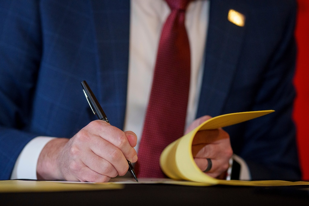 Gov. Spencer Cox signs two social media regulation bills during a ceremony at the Capitol building in Salt Lake City on Thursday, March 23, 2023. Cox signed a pair of measures that aim to limit when and where children can use social media and stop companies from luring kids to the sites. (Trent Nelson/The Salt Lake Tribune via AP)