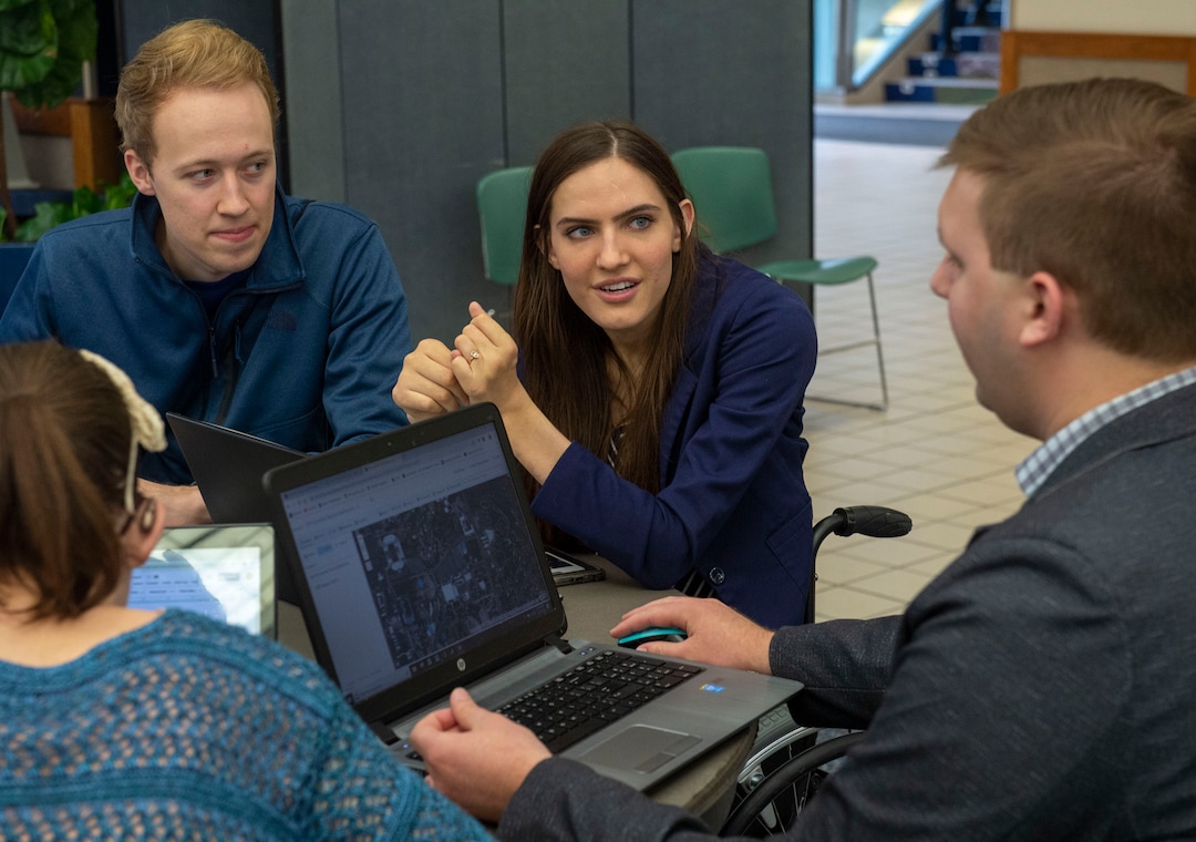 (Rick Egan  |  The Salt Lake Tribune)     Topher Taylor listens as Kendra Muller talk with Caleb Stewart, and Megan McLaws, about accessibility issues on BYU campus. Muller is leading a group that's challenging how BYU accommodates students with disabilities. Wednesday, April 17, 2019.