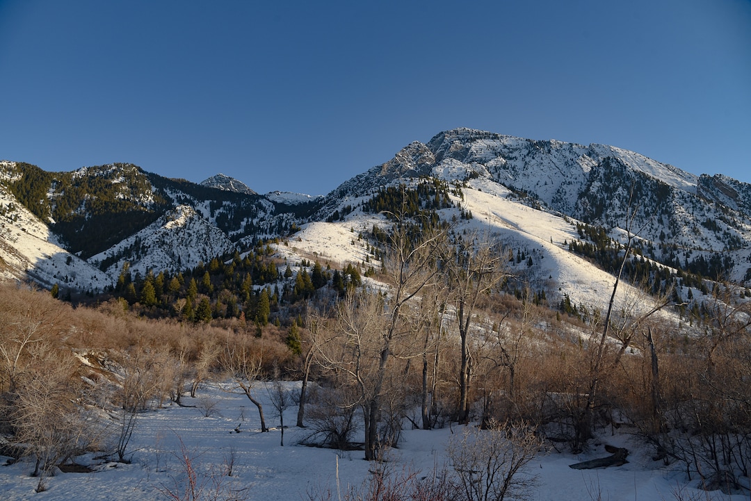 (Francisco Kjolseth  |  The Salt Lake Tribune) The sun sets on Mount Olympus in Neffs Canyon in Salt Lake City County as a proposed alignment for the Bonneville Shoreline Trail crosses designated wilderness in several spots along the Wasatch foothills. A forthcoming bill from Rep. John Curtis, R-Utah, would adjust wilderness boundaries so that the trail could accommodate mountain bikes, which are not allowed in wilderness areas.