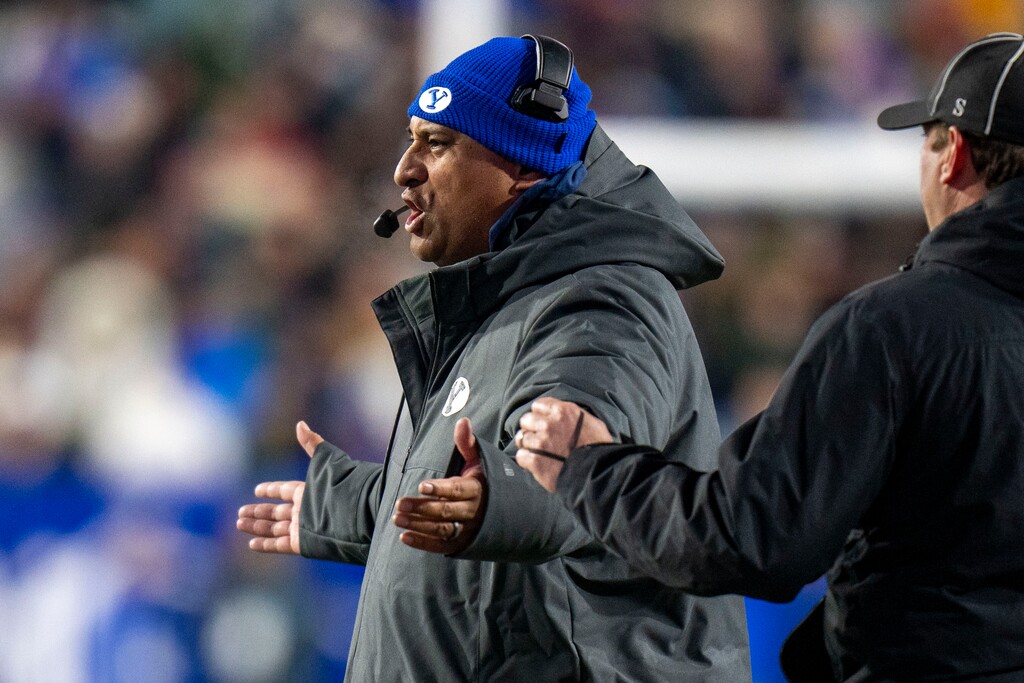 (Rick Egan | AP) BYU head coach Kalani Sitake reacts after a call by the official during a game on Nov. 30, 2024.