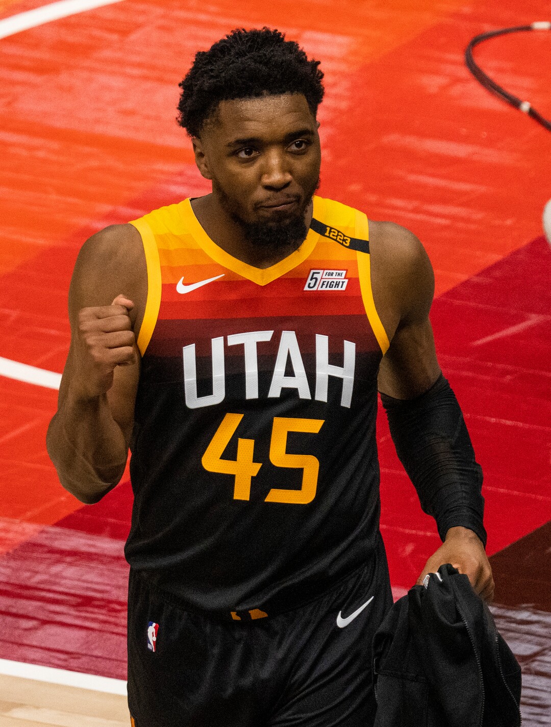 (Rick Egan | The Salt Lake Tribune) Utah Jazz guard Donovan Mitchell (45) pumps his fist as he walks to the locker room, after the Jazz defeated the Memphis Grizzlies 141-129, in game 2 of the NBA Playoffs at Vivint Arena, on Wednesday, May 26, 2021.