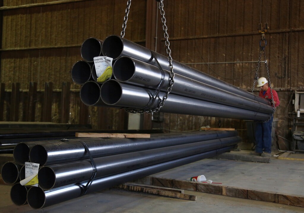 (Rod Aydelotte | Waco Tribune-Herald via AP) In this Friday, July 13, 2018, photo, a worker lifts steel tubing to be shipped out from Metals 2 Go at its plant in Waco, Texas. As President Donald Trump's trade war plays out on the world stage, local small businesses are feeling the pinch and looking for strategies to ride out the storm.