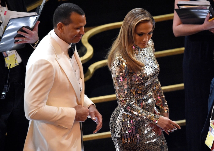 Alex Rodriguez, left, and Jennifer Lopez appear in the audience prior to the start of the Oscars on Sunday, Feb. 24, 2019, at the Dolby Theatre in Los Angeles. (Photo by Chris Pizzello/Invision/AP)