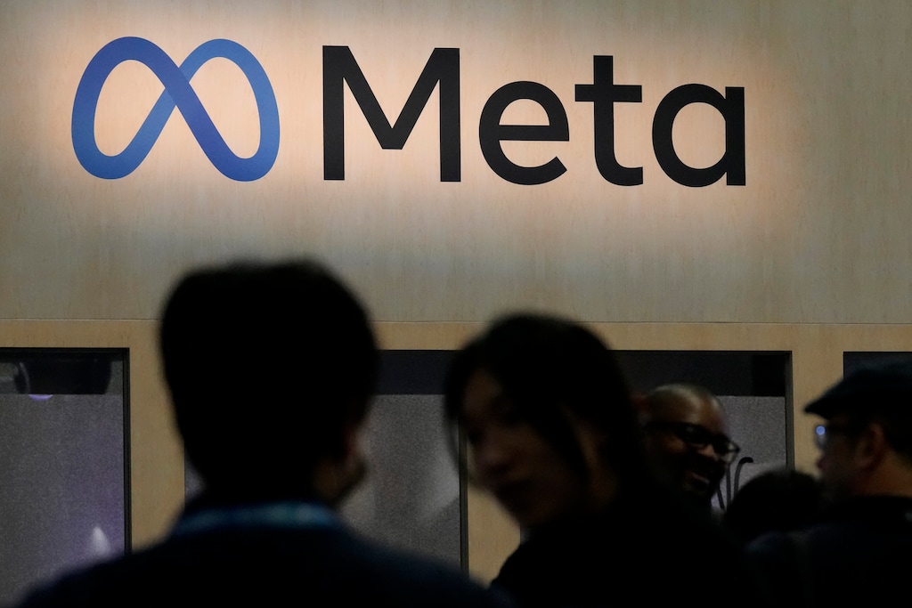 FILE - Attendees visit the Meta booth at the Game Developers Conference 2023 in San Francisco on March 22, 2023. TikTok and Facebook owner Meta are filing legal challenges against new European Union rules designed to counter the dominance of digital giants and make online competition fairer by giving consumers more choice. (AP Photo/Jeff Chiu, File)