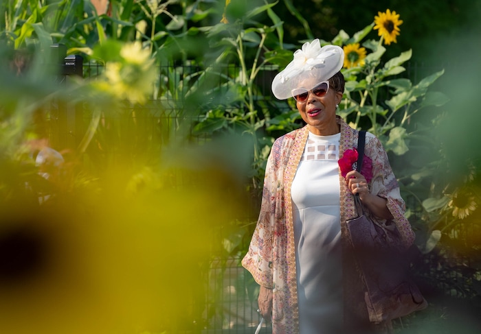 (Francisco Kjolseth | The Salt Lake Tribune) Jackie Thompson, portraying Mignon Barker Richmond, the first African American woman to graduate from college in Utah attends the unveiling of the newest community garden in Salt Lake City at Richmond Park on Wednesday, Aug. 4, 2021.