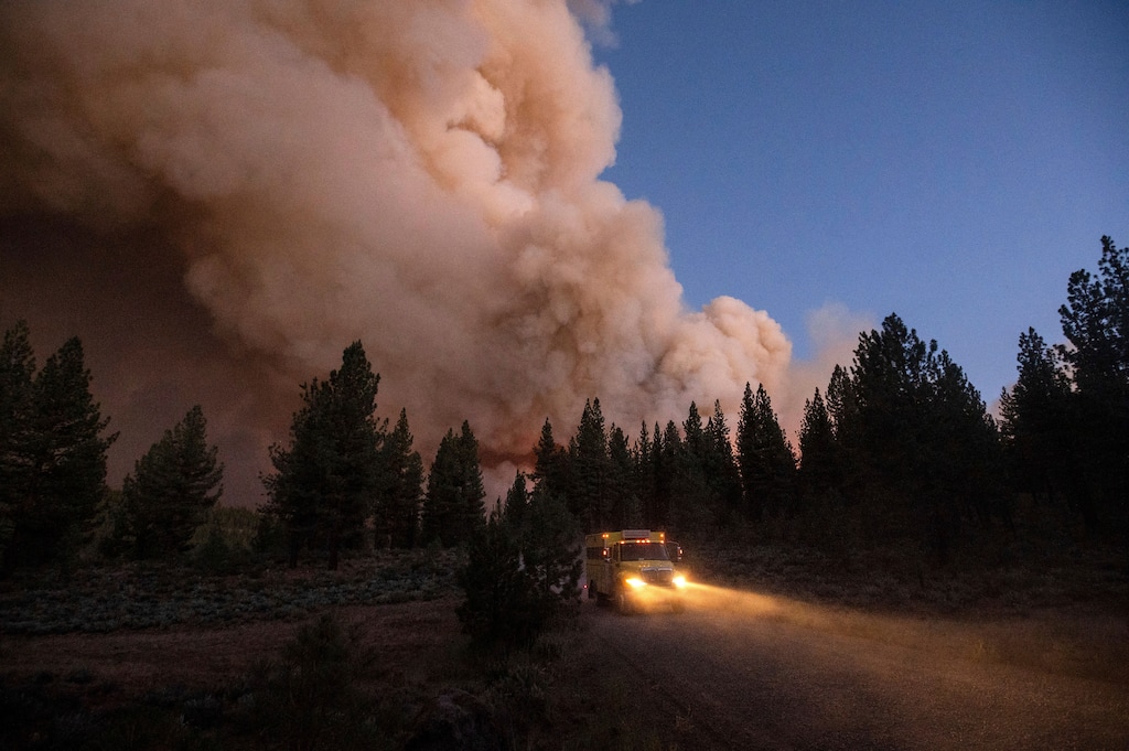 (Noah Berger | AP) Skies in Utah are hazy because of smoke blowing in from wildfires in northern California and southern Oregon, like this one in Plumas National Forest, Calif., on Thursday, July 8, 2021. The National Weather Service says the smoke is likely to remain at least through Tuesday.