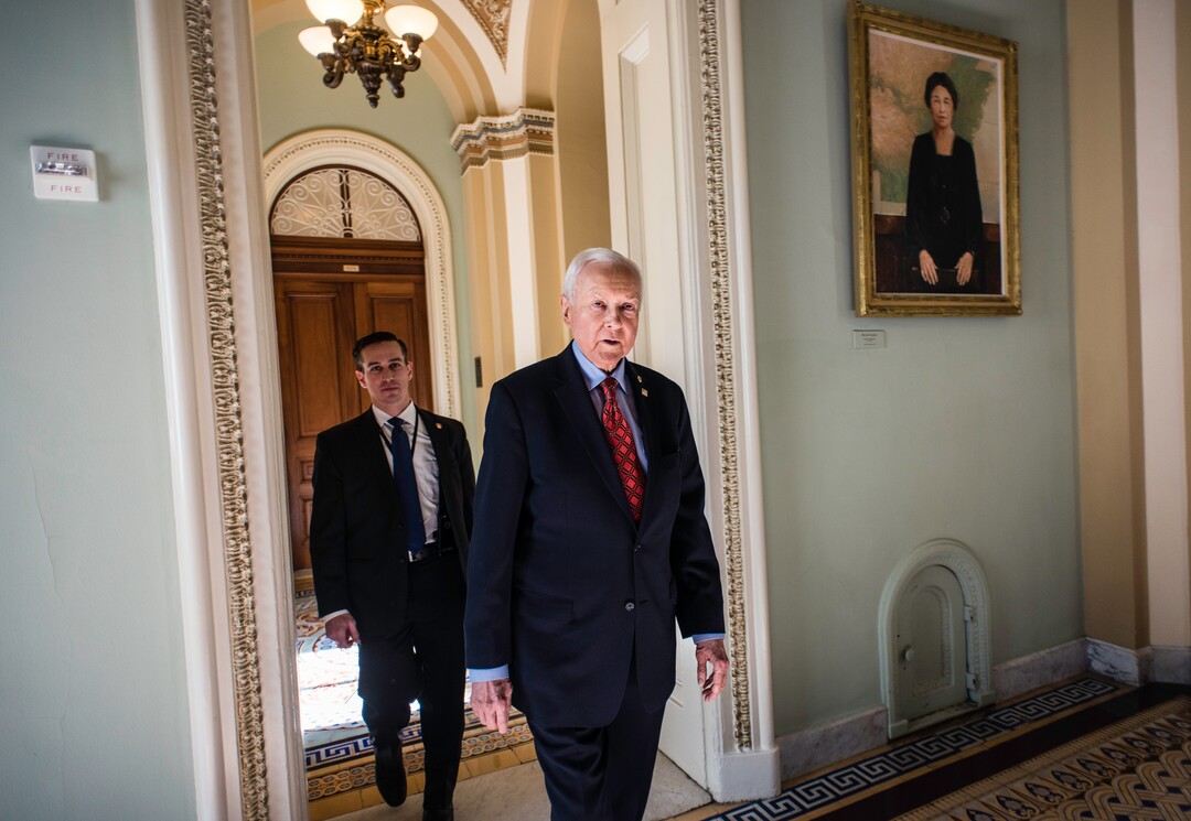(André Chung | Special to The Tribune) Followed by his security staff, Sen. Hatch makes his way to a luncheon in Washington D.C. on Dec. 21, 2017.