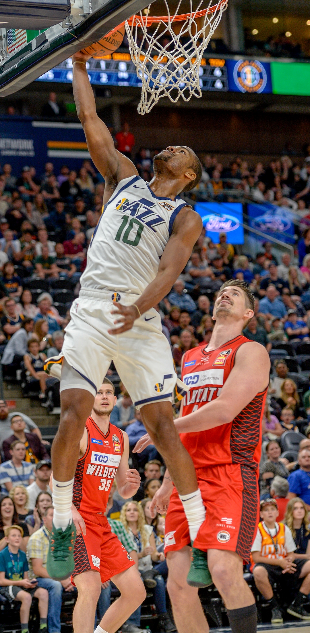 Leah Hogsten  |  The Salt Lake Tribune   Utah Jazz guard Alec Burks (10) hits the net in the first half as the Utah Jazz host the Perth Wildcats during their preseason game, Sept. 29, 2018 at Vinvint Smart Home Arena. 
