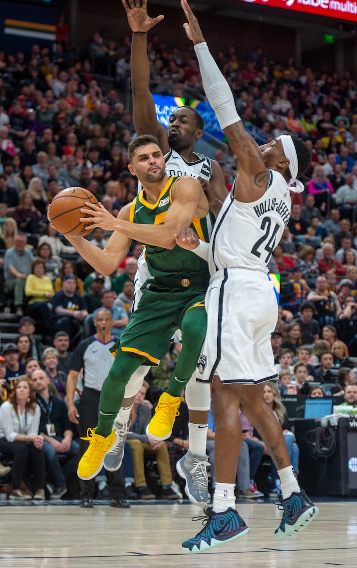 (Rick Egan  |  The Salt Lake Tribune)   Utah Jazz guard Raul Neto (25) gets ready to pass the ball, as he runs into Brooklyn Nets forward Rondae Hollis-Jefferson (24), in NBA action between Utah Jazz and Brooklyn Nets at Vivint Smart Home Arena, Saturday, March 16, 2019.


