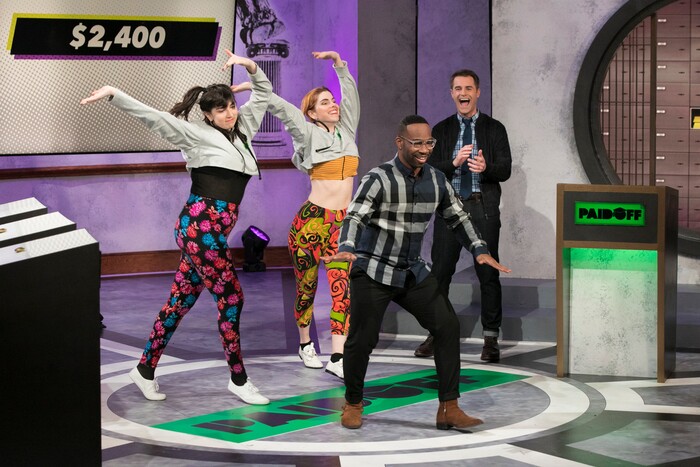 (Photo courtesy of truTV) Host Michael Torpey, right, cracks up during one of the bizarre moments on "Paid Off."