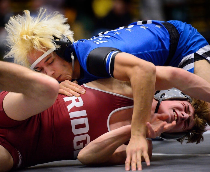 (Trent Nelson | The Salt Lake Tribune)  Pleasant Grove's Luis Garcia (top) and Northridge's Tyler Dennis, 6A State Championships, high school wrestling quarterfinals in Orem, Wednesday February 7, 2018.
