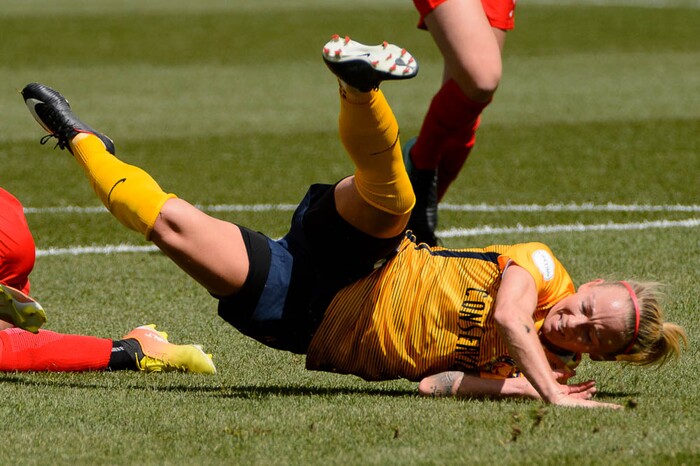 (Trent Nelson | The Salt Lake Tribune)  
Utah Royals FC hosts the Chicago Red Stars, at Rio Tinto Stadium in Sandy, Saturday April 14, 2018. Utah Royals FC midfielder Gunnhildur Jónsdóttir (23) is tripped up by Chicago Red Stars defender Samantha Johnson (16).