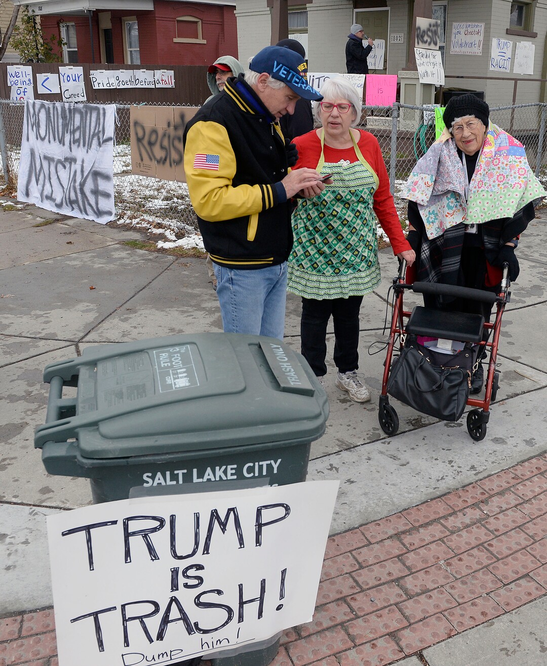(Al Hartmann  |  The Salt Lake Tribune) 	Crowds protest President Donald Trump outside LDS Welfare Square at 700 S. 800 W. as he tours the facility with church leaders Monday Dec 4. 