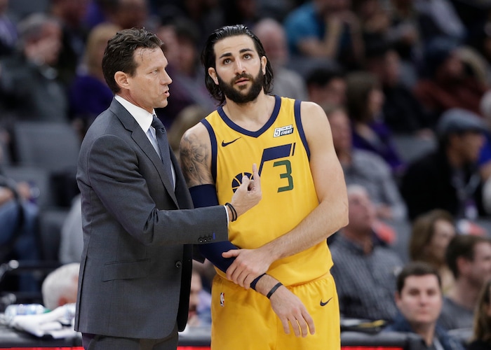 Utah Jazz coach Quin Snyder talks with guard Ricky Rubio during the first quarter of the team's NBA basketball game agains the Sacramento Kings on Saturday, March 3, 2018, in Sacramento, Calif. (AP Photo/Rich Pedroncelli)