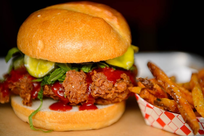 (Trent Nelson | The Salt Lake Tribune)  
Nomad Eatery, a new fast-casual restaurant near the airport in Salt Lake City. The chef/owner is Justin Soelberg, who worked at Avenues Proper and Proper Burger before launching this new eatery. Thursday March 22, 2018. Spicy chicken sandwich.