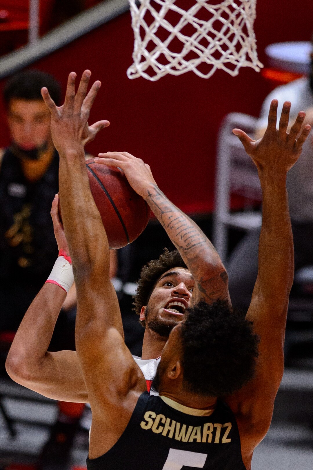 (Trent Nelson  |  The Salt Lake Tribune) Utah Utes forward Timmy Allen (1) shoots over Colorado Buffaloes guard D'Shawn Schwartz (5) as Utah hosts Colorado, NCAA basketball in Salt Lake City on Monday, Jan. 11, 2021.