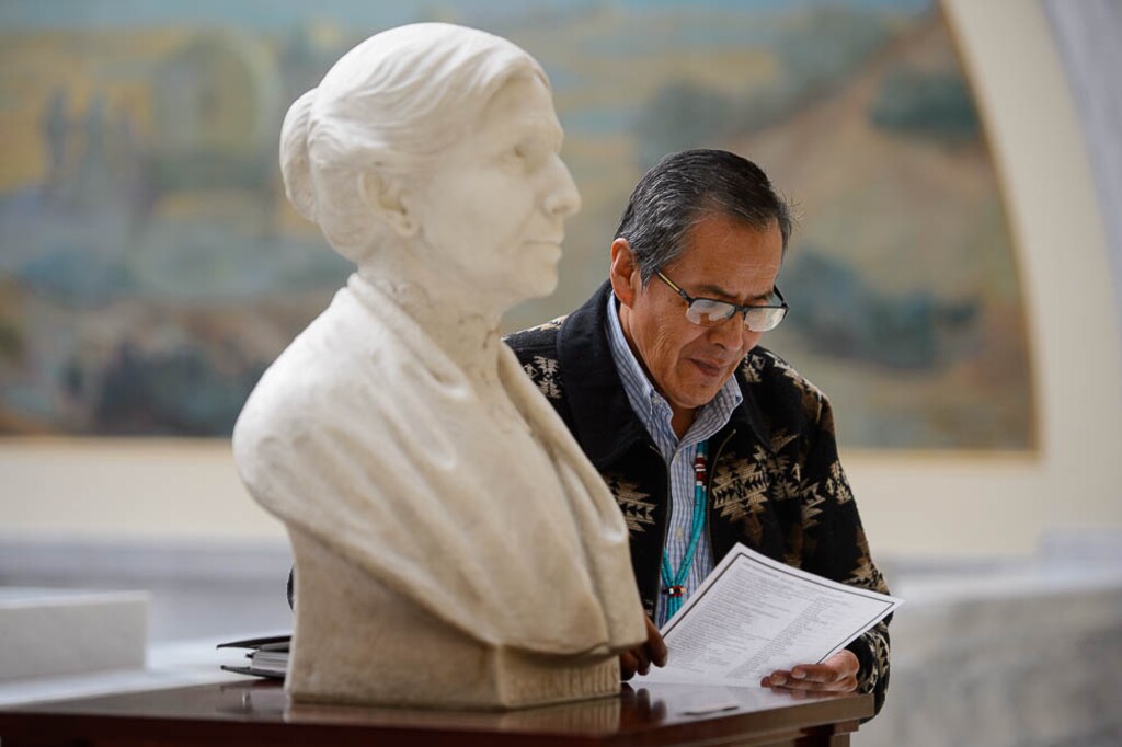 (Trent Nelson | The Salt Lake Tribune) Kenneth Maryboy next to a bust of Emmeline B. Wells after visiting with the House Democratic caucus in Salt Lake City on Tuesday Feb. 12, 2019.