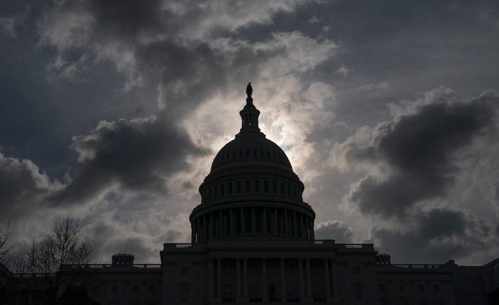 (J. Scott Applewhite | AP file photo)  In this April 12, 2019, file photo, morning clouds cover Capitol Hill in Washington.
