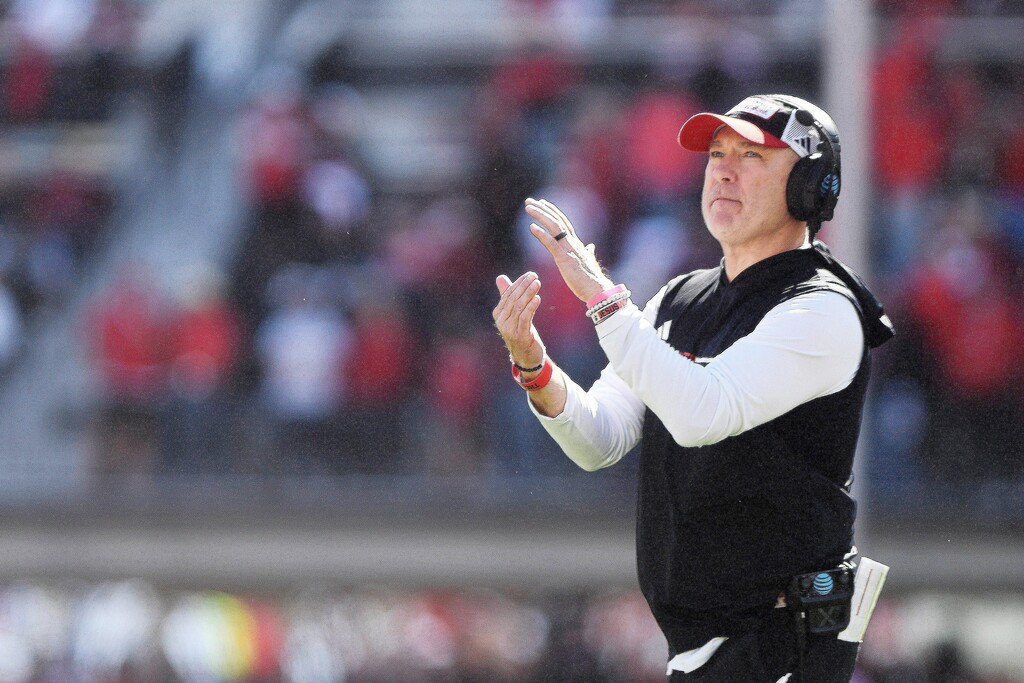 (Annie Rice | AP) Texas Tech head coach Joey McGuire gestures for a timeout during a football game against BYU on Nov. 8, 2025, in Lubbock, Texas.