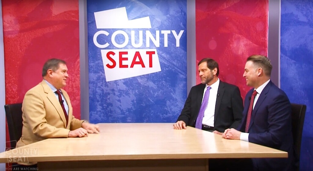 (Screengrab | YouTube/The County Seat) Chad Booth, left, hosts a 2019 discussion with Utah Association of Counties CEO Adam Trupp, center, and the association's Lincoln Shurtz on the weekly television show "County Seat," which has been on air for 10 seasons.