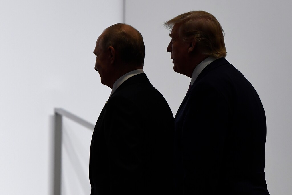 (Susan Walsh | AP file photo)
In this June 28, 2019, photo, President Donald Trump and Russian President Vladimir Putin walk to participate in a group photo at the G20 summit in Osaka, Japan.