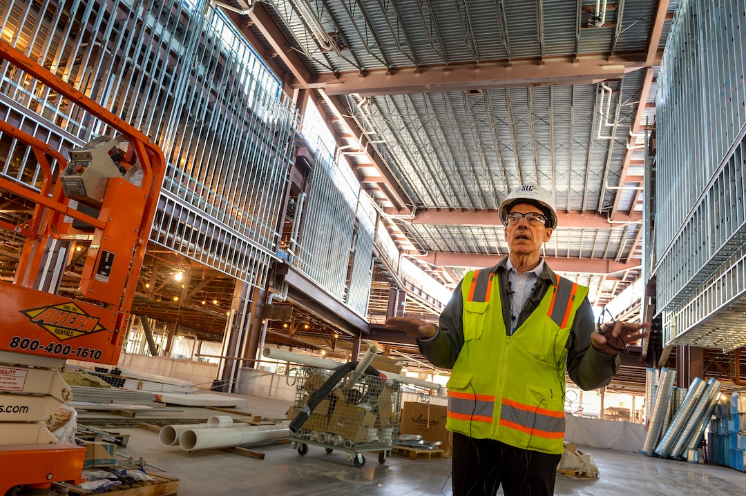 Leah Hogsten  |  The Salt Lake Tribune "We're building a new house on top of our old house," said Mike Williams, airport redevelopment project manager, leading members of the media on a tour of the airport expansion construction site, Monday, Oct. 22, 2018. The first phase construction of the $3.6 billion project is due to open in 700 days. Nearing completion is the new concourse for aircraft gates, an enclosed terminal, the steel skeleton of a new "gateway" building, a five-story parking garage and elevated roadways. 