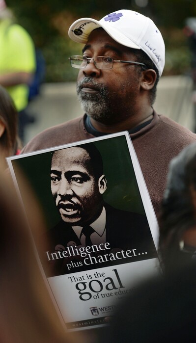 Steve Griffin | The Salt Lake Tribune
Charles Tyler, of Logan participates in Westminster College's annual march in honor of Dr. Martin Luther King Jr. in Salt Lake City, Monday, January 19, 2015. Tyler's daughter, Tanesha Tyler, was a student speaker during the event.