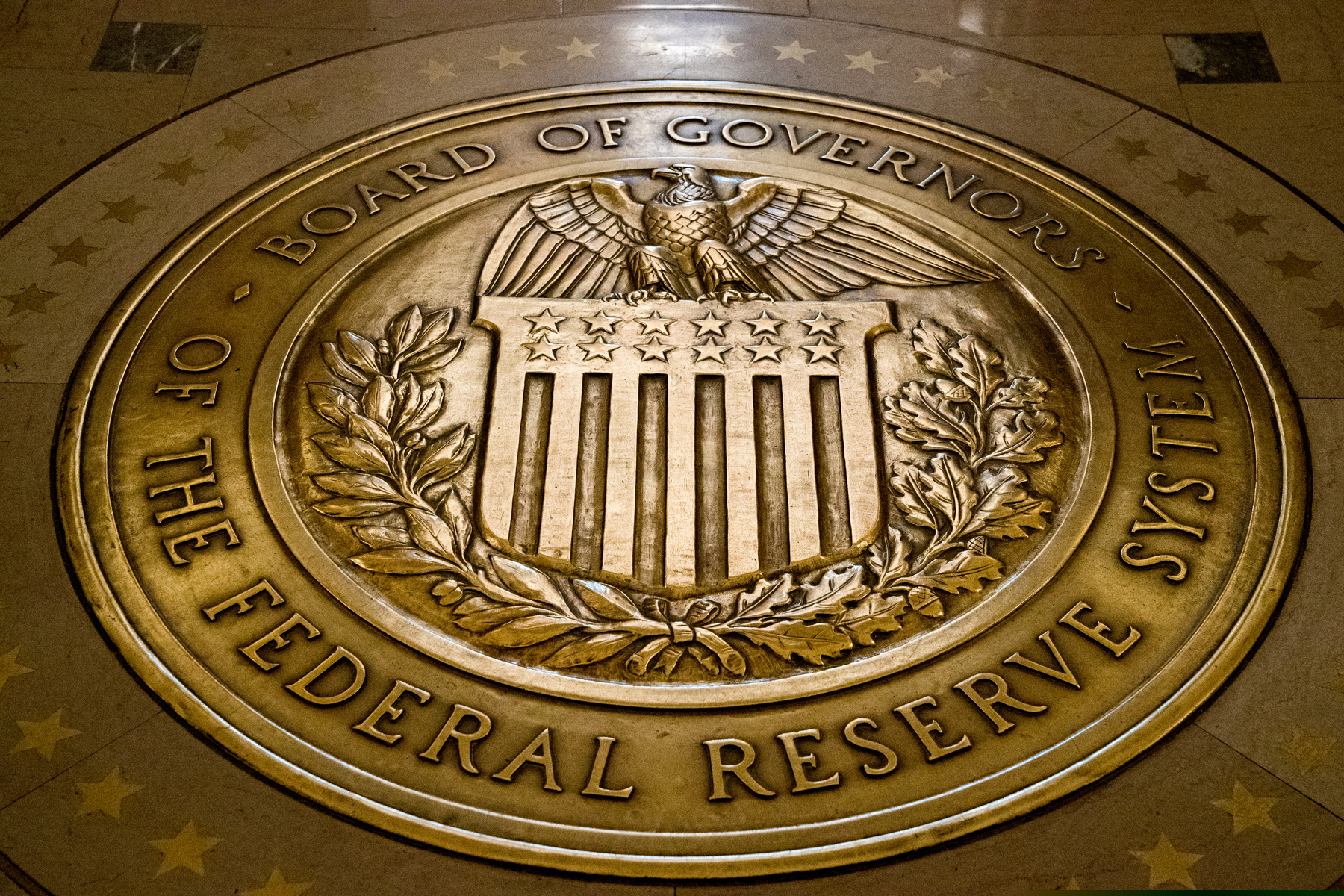 (Andrew Harnik | AP photo)

This Feb. 5, 2018, photo shows the seal of the Board of Governors of the United States Federal Reserve System in the ground at the Marriner S. Eccles Federal Reserve Board Building in Washington.