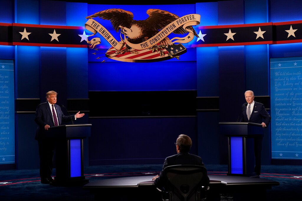 (Patrick Semansky | AP file photo)  Moderator Chris Wallace of Fox News listens as President Donald Trump and Democratic candidate former Vice President Joe Biden participate in the first presidential debate Tuesday, Sept. 29, 2020, at Case Western University and Cleveland Clinic, in Cleveland, Ohio.