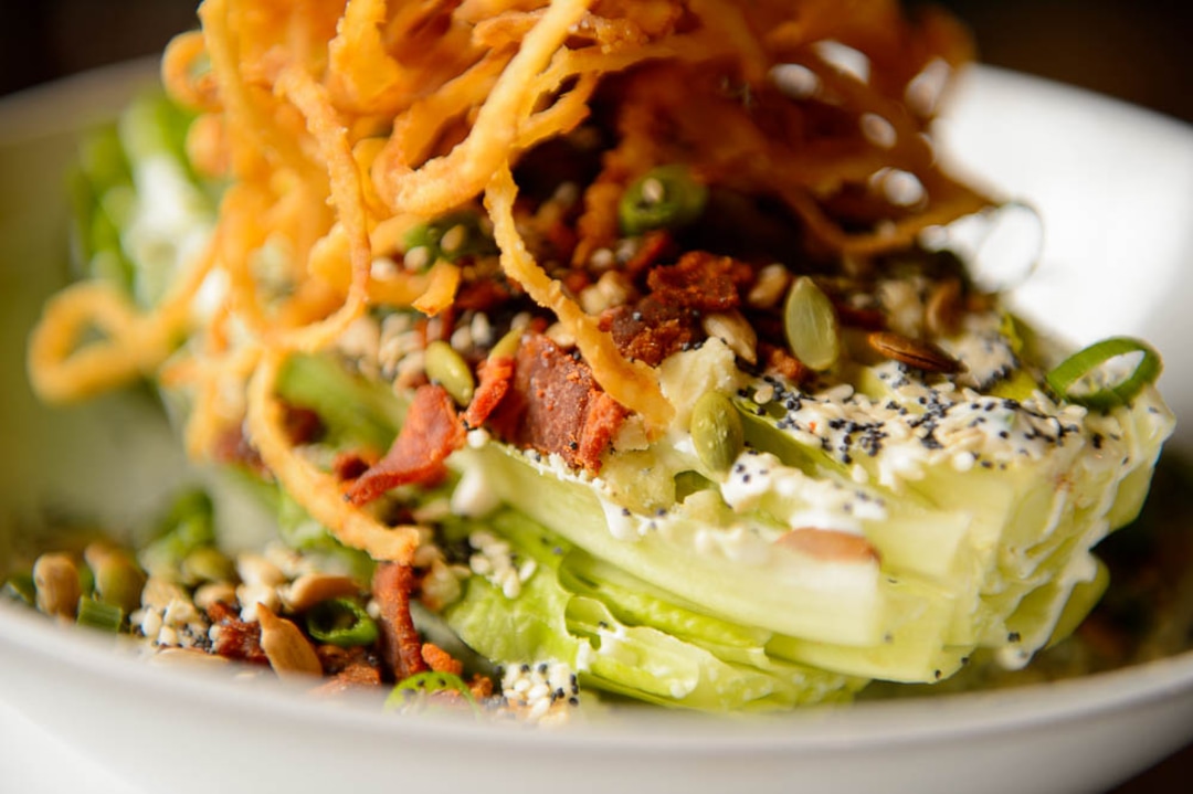 (Trent Nelson | The Salt Lake Tribune)  Nomad Eatery, a new fast-casual restaurant near the airport in Salt Lake City. The chef/owner is Justin Soelberg, who worked at Avenues Proper and Proper Burger before launching this new eatery. Thursday March 22, 2018. Wedge salad.